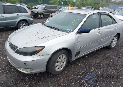 2003 Toyota Camry Xle z USA, uszkodzony, nr VIN 4T1BE30K33U190284
